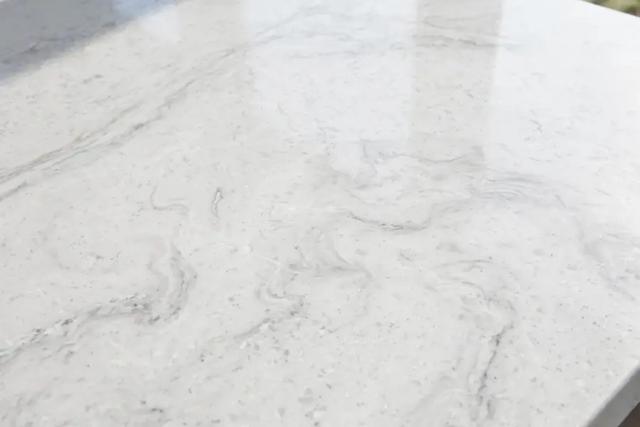 New polished white quartz kitchen countertop with subtle veining in a Dallas kitchen